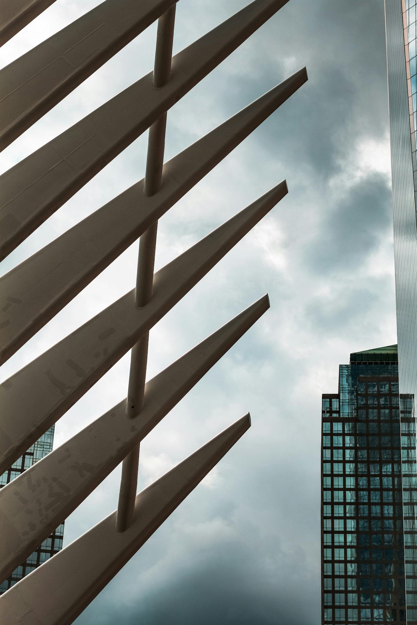 A photo of a tall building with a metal structure